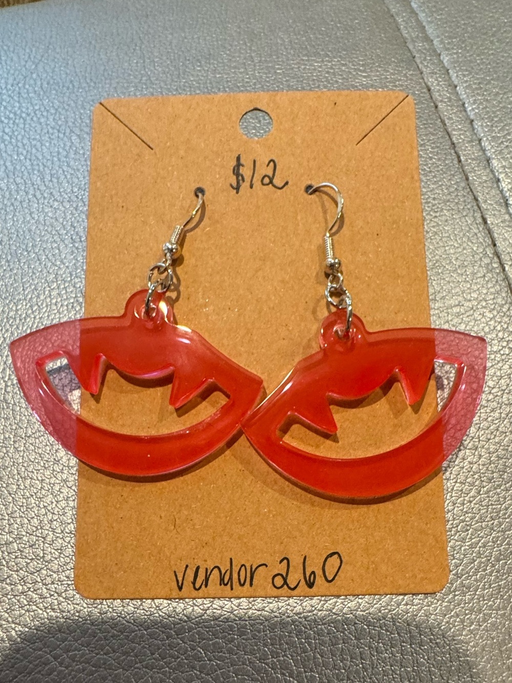 Pink transparent vampire fang earrings